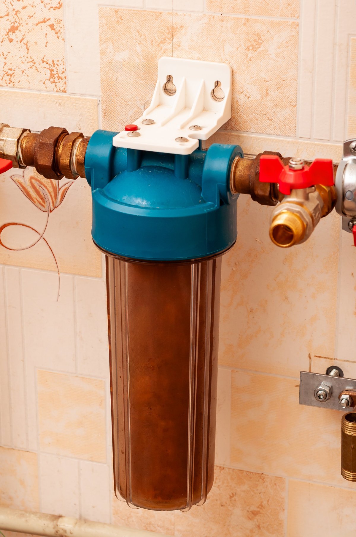 Household water filter maintained by a technician
